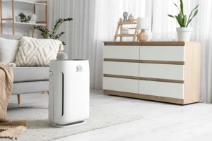 Modern air purifier on carpet in living room